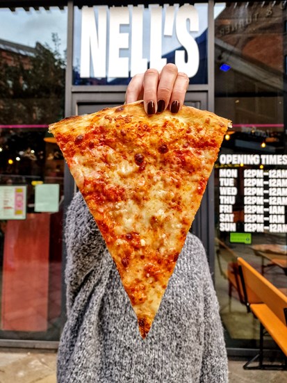 Nell's pizza slice